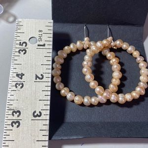 Sterling silver clasps,creamy tan fresh water pearls hoop earring’s. 2 1/8 long